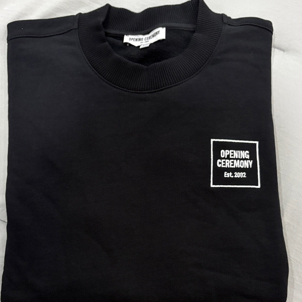 Opening Ceremony Black Crewneck Sweatshirt with White Logo Patch